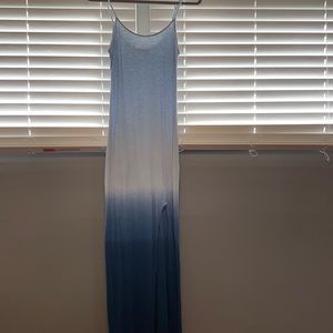 Long dress and has slit up to the thigh